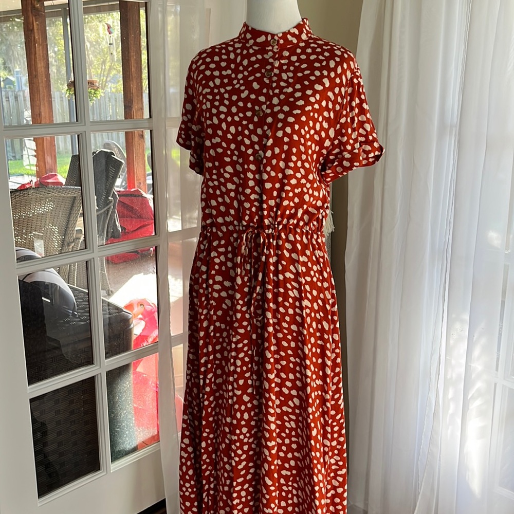 Miss sparkling dress Sz small rust color with animal print in cream.